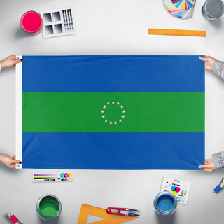 A mockup of the custom flag 'Hornes Creek flag' held up on a table during print checking
