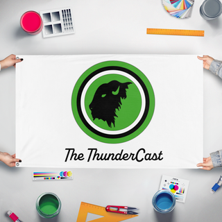 A mockup of the custom flag 'ThunderCast White flag' held up on a table during print checking