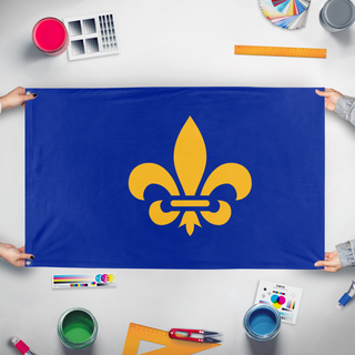 A mockup of the custom flag 'New French flag' held up on a table during print checking