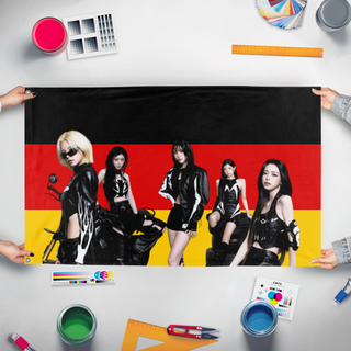 A mockup of the custom flag 'Itzy flag' held up on a table during print checking