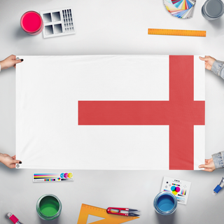 A mockup of the custom flag 'mmmm flag' held up on a table during print checking