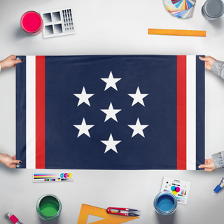 A mockup of the custom flag 'FCU flag' held up on a table during print checking