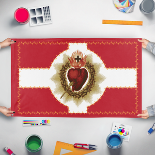 A mockup of the custom flag 'Sacred Heart of Jesus flag' held up on a table during print checking