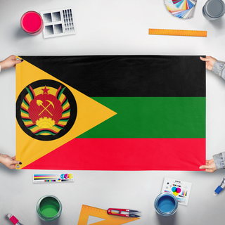 A mockup of the custom flag 'Socialist Republic of Africa flag' held up on a table during print checking