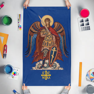 A mockup of the custom flag 'Archangel St. Michael flag' held up on a table during print checking