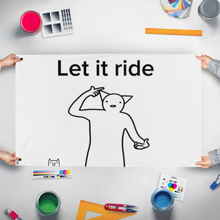 A mockup of the custom flag 'let it ride flag' held up on a table during print checking