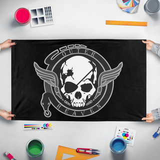 A mockup of the custom flag 'Outer Heaven flag' held up on a table during print checking