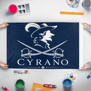 A mockup of the custom flag 'Cyrano flag' held up on a table during print checking