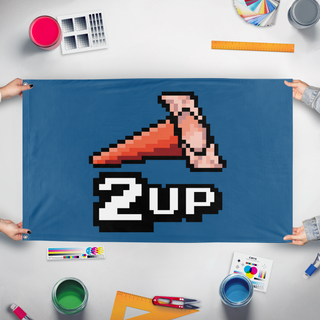 A mockup of the custom flag '2up flag' held up on a table during print checking