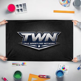 A mockup of the custom flag 'TWN flag' held up on a table during print checking