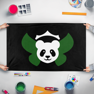 A mockup of the custom flag 'pandatomorrow flag' held up on a table during print checking
