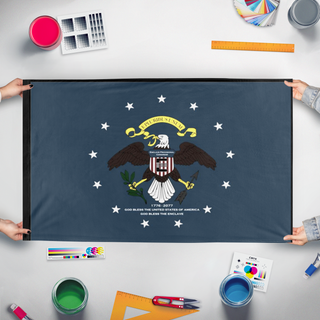 A mockup of the custom flag 'h flag' held up on a table during print checking