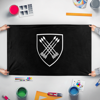A mockup of the custom flag '32 Battalion flag' held up on a table during print checking