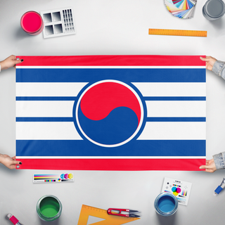 A mockup of the custom flag 'unification flag' held up on a table during print checking