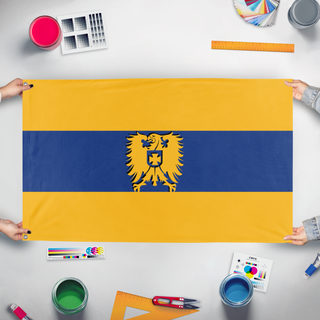 A mockup of the custom flag 'Flag' held up on a table during print checking