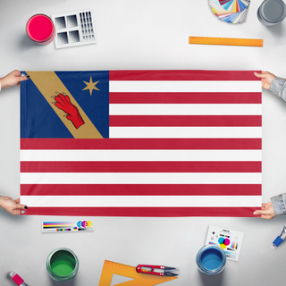 A mockup of the custom flag 'Special-Speciale Family flag' held up on a table during print checking