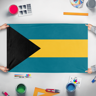 A mockup of the custom flag 'test flag' held up on a table during print checking