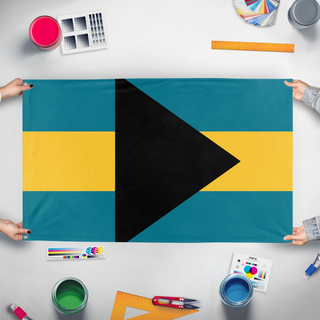 A mockup of the custom flag 'test flag' held up on a table during print checking