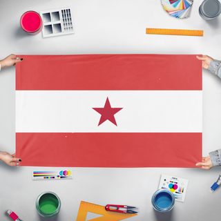 A mockup of the custom flag 'Communist Austria flag' held up on a table during print checking