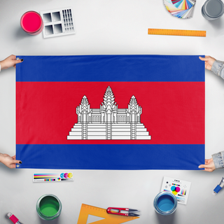 A mockup of the custom flag 'T flag' held up on a table during print checking