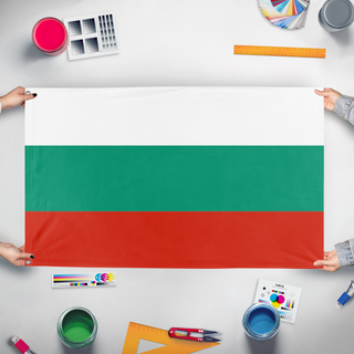A mockup of the custom flag 'T flag' held up on a table during print checking
