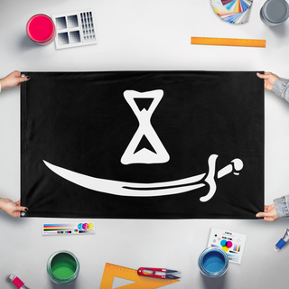 A mockup of the custom flag 'Breakaway flag' held up on a table during print checking