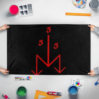 A mockup of the custom flag 'tob flag' held up on a table during print checking