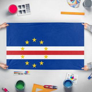 A mockup of the custom flag '1 flag' held up on a table during print checking