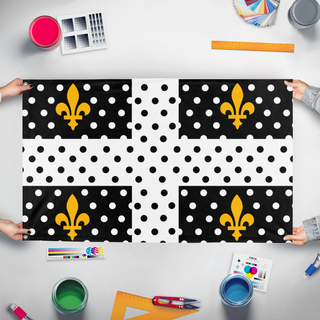 A mockup of the custom flag 'ADP flag' held up on a table during print checking