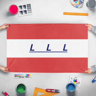 A mockup of the custom flag 'LLL flag' held up on a table during print checking