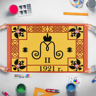 A mockup of the custom flag 'baron flag' held up on a table during print checking