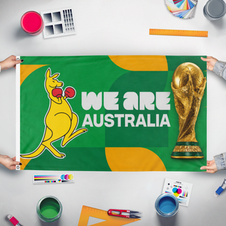 A mockup of the custom flag 'we are australia flag' held up on a table during print checking