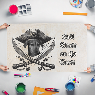 A mockup of the custom flag 'Last Toast flag' held up on a table during print checking