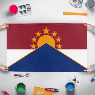 A mockup of the custom flag 'Parliamentary Republic of Marang flag' held up on a table during print checking
