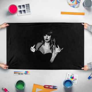 A mockup of the custom flag 'ts flag' held up on a table during print checking