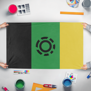 A mockup of the custom flag 'f flag' held up on a table during print checking