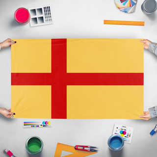 A mockup of the custom flag 'Kalmar Union flag' held up on a table during print checking