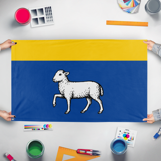 A mockup of the custom flag 'Schafer_arms flag' held up on a table during print checking