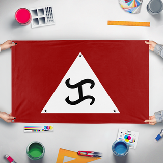 A mockup of the custom flag 'Official NMKO flag V1' held up on a table during print checking