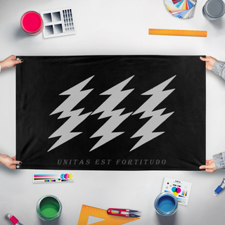 A mockup of the custom flag 'unity flag' held up on a table during print checking