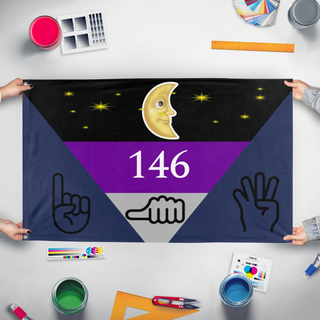 A mockup of the custom flag '146 flag' held up on a table during print checking