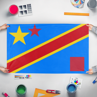 A mockup of the custom flag 'test flag' held up on a table during print checking