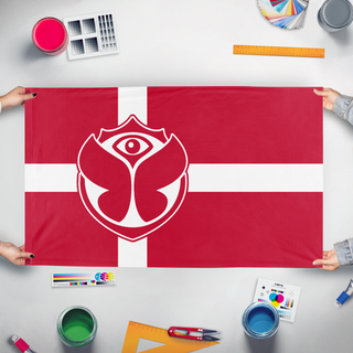 A mockup of the custom flag 'Tomorrowland Denmark flag' held up on a table during print checking
