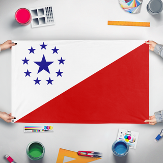 A mockup of the custom flag 'raspia flag' held up on a table during print checking