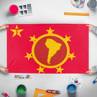 A mockup of the custom flag 'Peoples Federation  of South America flag' held up on a table during print checking