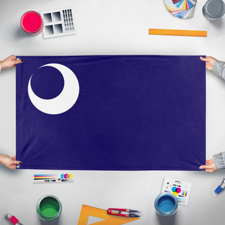 A mockup of the custom flag 'Fort Moultrie flag' held up on a table during print checking