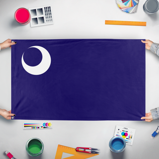 A mockup of the custom flag 'Fort Moultrie flag' held up on a table during print checking