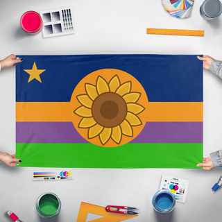 A mockup of the custom flag 'Kansas Redesign 2 flag' held up on a table during print checking