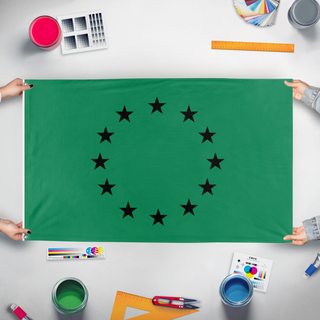 A mockup of the custom flag 'Gais flag' held up on a table during print checking