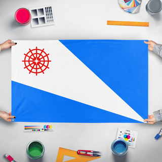 A mockup of the custom flag 'Marietta flag' held up on a table during print checking